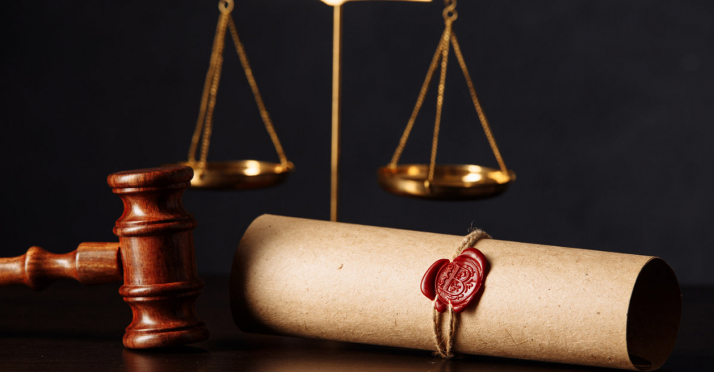 Wooden Gavel, Scale, and Document on a Table | What Happens in Probate Court | The TGQ Law Firm