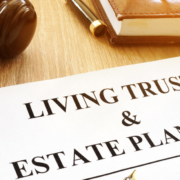 Living trust and estate planning form on a desk. Living trusts and estate planning | The TGQ Law Firm