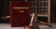 Inheritance Law Book With Gavel Hammer | Leaving Money To Grandchildren | The TGQ Law Firm