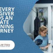 Estate Planning Attorney, Terrence Quinn Leaning Against The Front Desk and Smiling at The TGQ Law Firm | Why Every Caregiver Needs An Estate Planning Attorney | The TGQ Law Firm