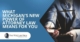 A Lawyer in a Suit Reaching Towards the Scales of Justice on a Table | What Michigan's New Power of Attorney Law Means For You | The TGQ Law Firm
